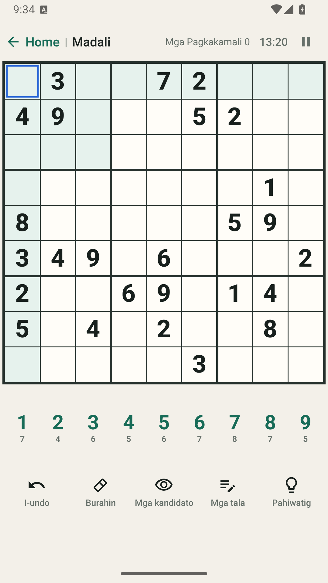 Platon Sudoku sa Filipino sa Android, na may board, number keypad at mga gamit sa laro.
