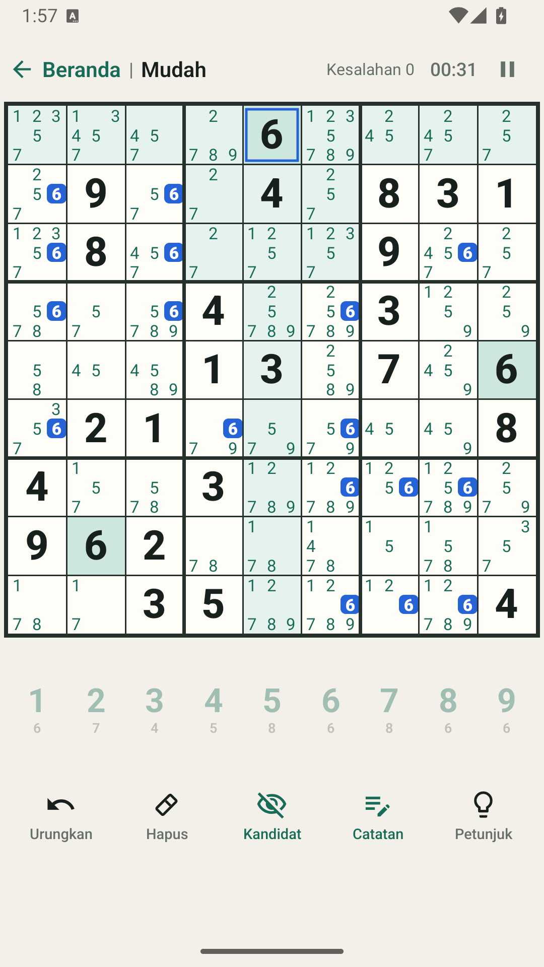 Catatan kandidat otomatis pada sel kosong sudoku.